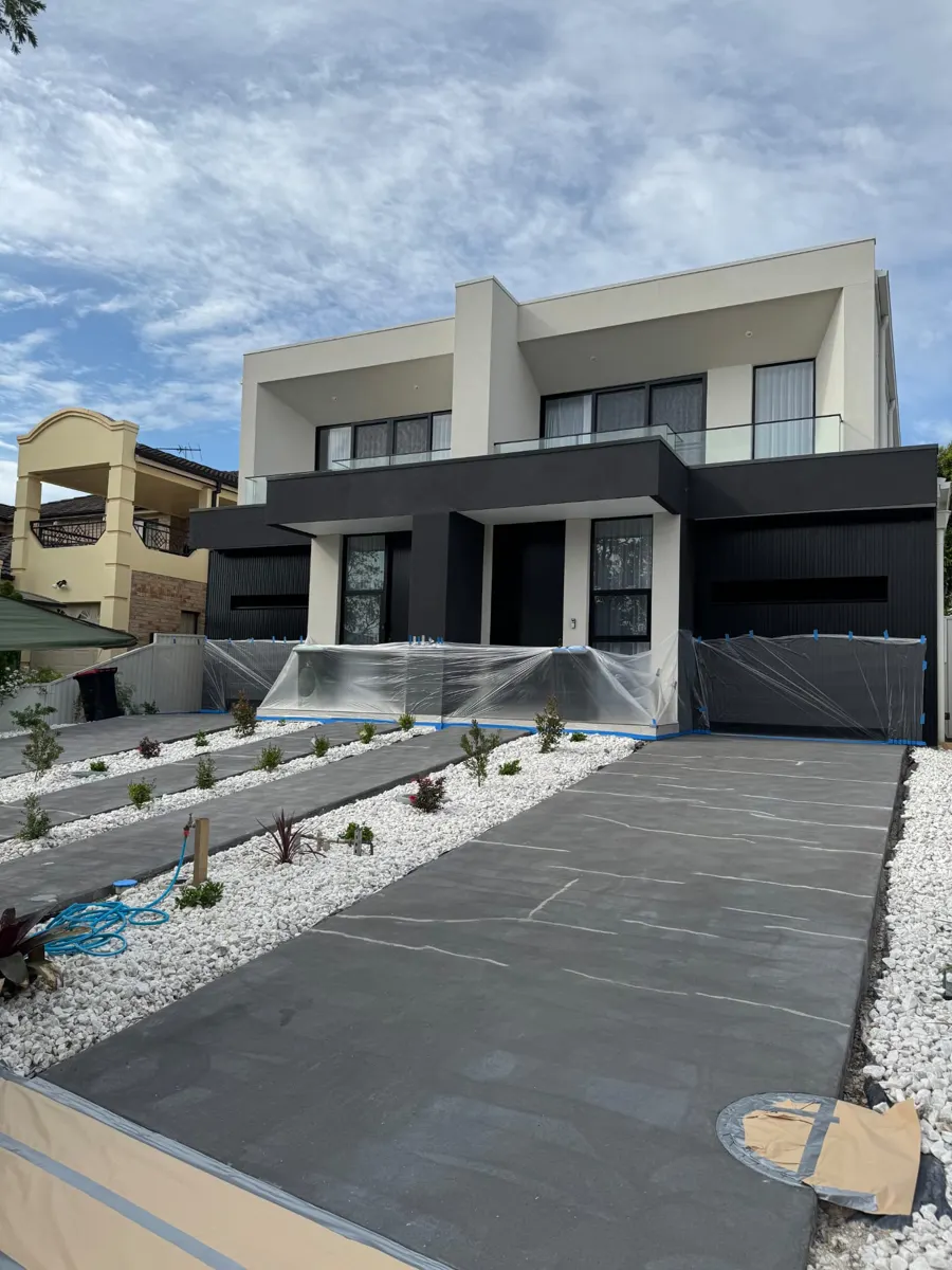 Modern charcoal driveway finish — before